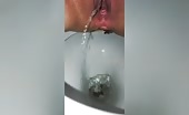 Juicy pussy has lot of pee to give