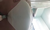 Sexy redhead strains her white panties