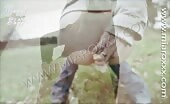 Man shitting outdoors with long brown turd hanging out