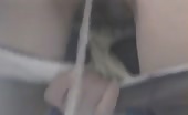 Granny shitting on her hand while squatting