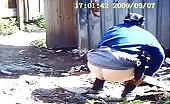 Old woman pees and poops outdoors
