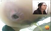 Woman shitting in a toilet with piss streaming out