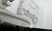 Lady shitting in the office toilet 