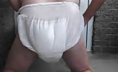 Man shitting after dropping diaper, turd on paper