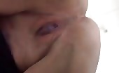 Fat lady showing her gaping pussy while shitting 