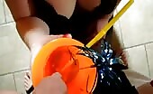 Drinking fresh piss from cup