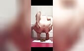 Woman shits on paper then smears it on her face