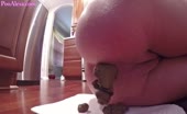 Nude ass drops thick turd on kitchen floor