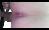 Guy shitting runny brown crap into his hand
