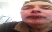 Man eating his own turd from a napkin